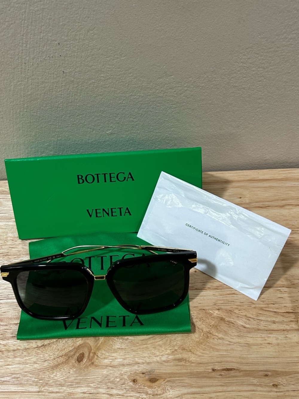 Bottega Veneta Black Sunglasses with Gold Accents